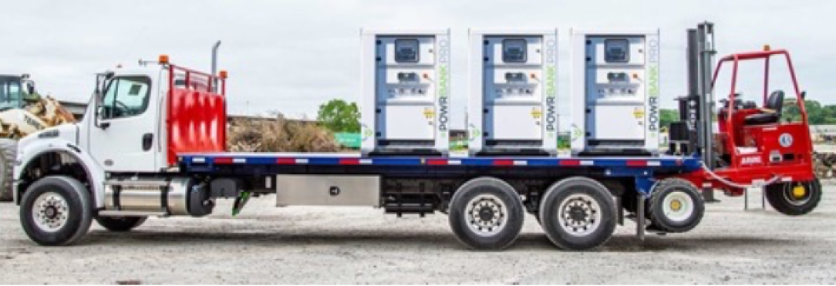 A flatbed truck or trailer with a “piggyback” forklift can make swapping depleted batteries for charged ones a snap.