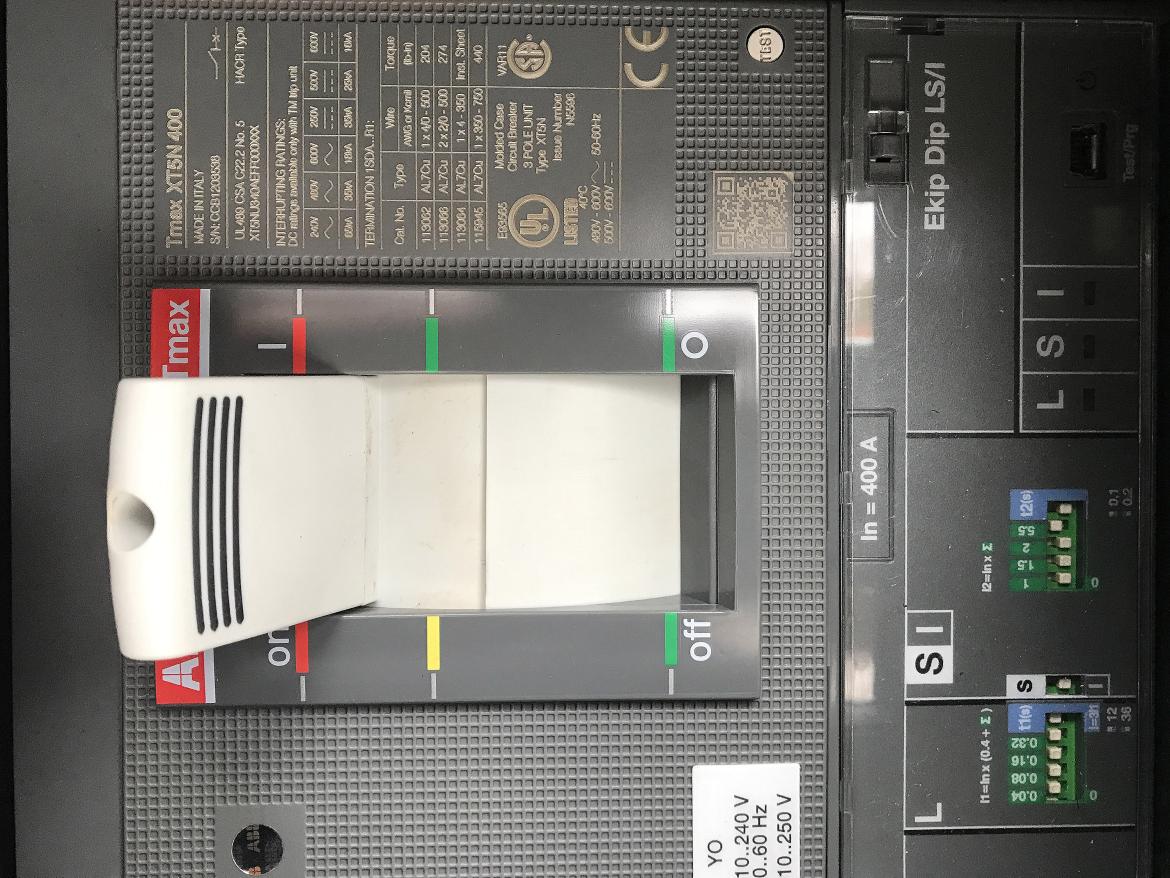 Figure 8: The ABB T-MA breaker (left) and settings of its PR211DS-LS/I control unit in the variable disconnect placed just downstream of the 1400A diesel generator providing power to the library set of Knives Out. Note: it is configured for an In of 400A and I2 of 2200A.