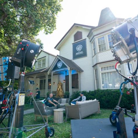 View of house with camera gear in front. 