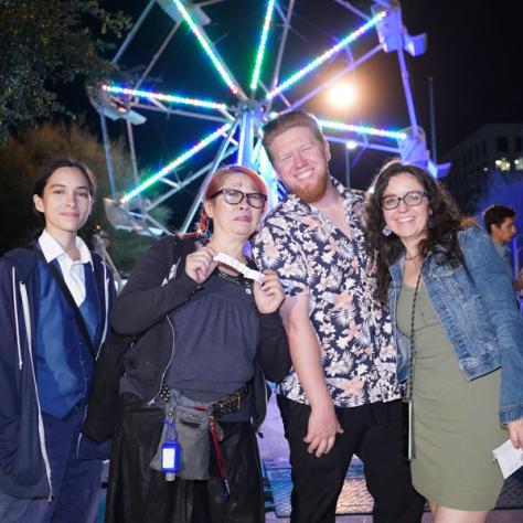 People posing for photo.