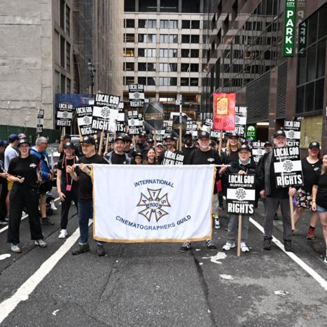 People marching in Labor Day parade.
