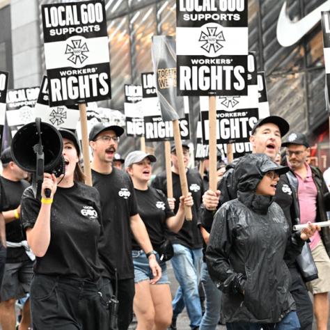 People marching in Labor Day parade.