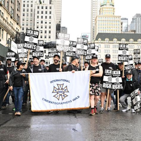 People marching in Labor Day parade.