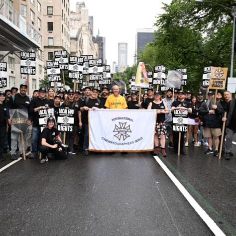 People marching in Labor Day parade.