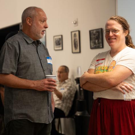 Two people talking. 