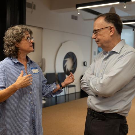 Two people talking. 