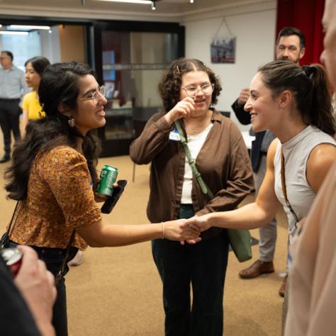 Women shaking hands. 