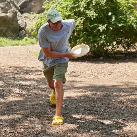 Man throwing frisbee. 