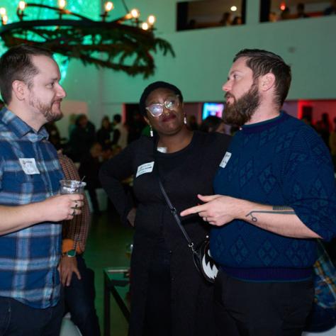Candid photo of people talking. 