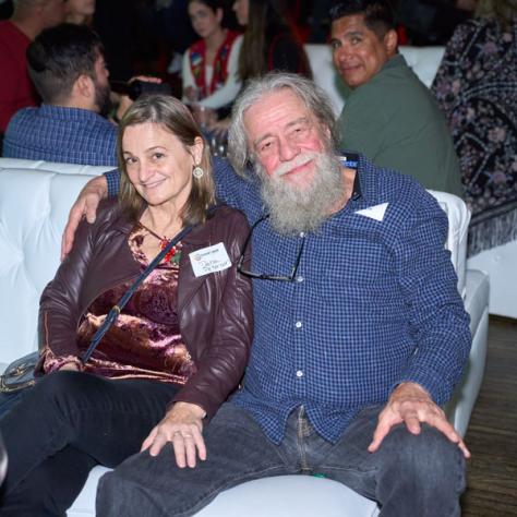 Two people posing for photo. 