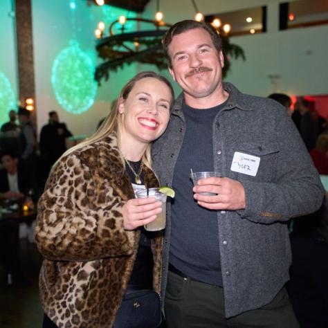 Two people posing for photo. 