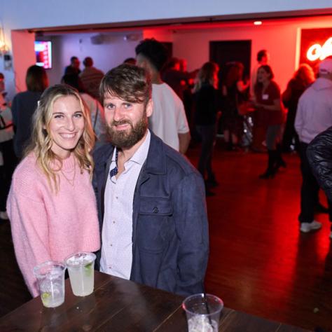 Two people posing for photo. 