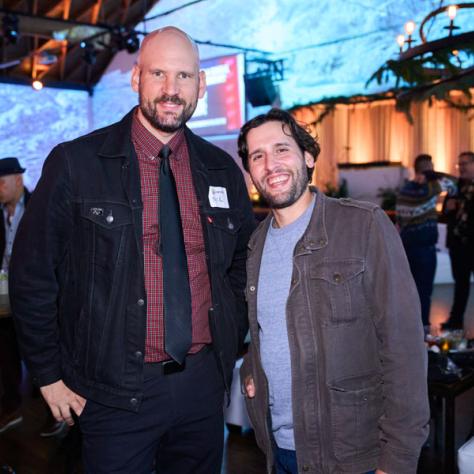 Two people posing for photo. 