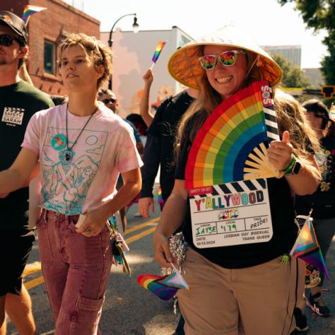Photo of people marching in parade. 