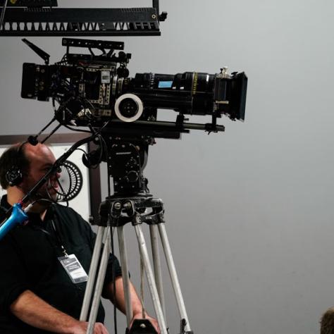 Person working with camera.