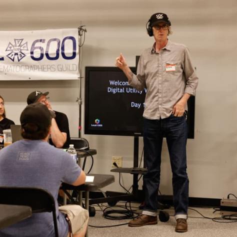 Man standing in front of audience.