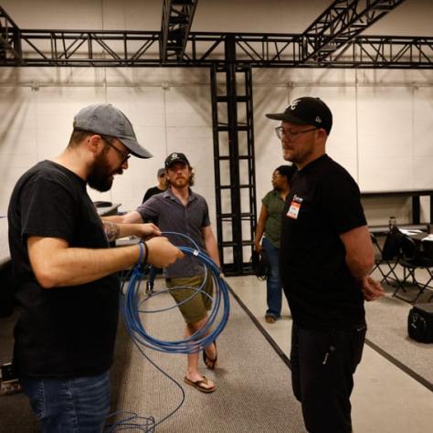 Man working with cable. 