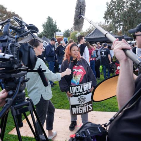People at rally on camera. 