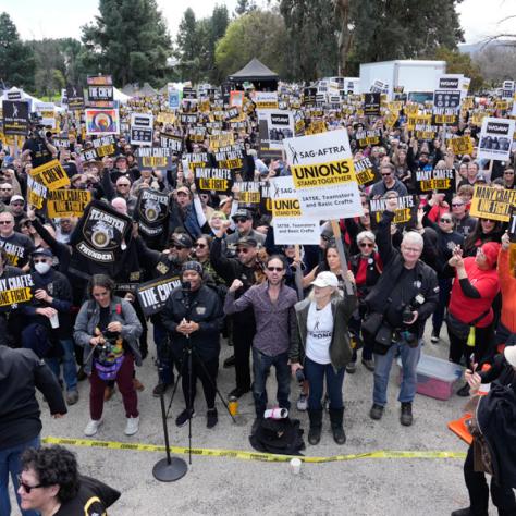 Large crowd of people at rally. 
