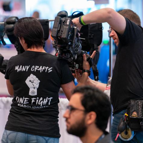 Local 600 Camera Operator Shanele Alvarez, SOC, sporting her #IASolidarity swag at NAB Show.