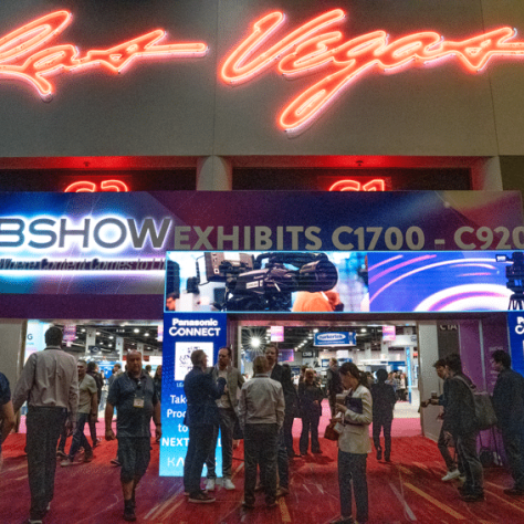 NAB Show exhibit hall with big Las Vegas sign above it. 