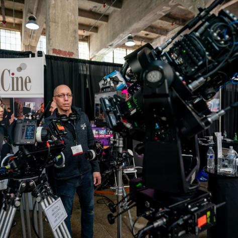 People behind a big camera. 