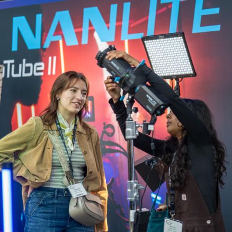 People working with a camera. 