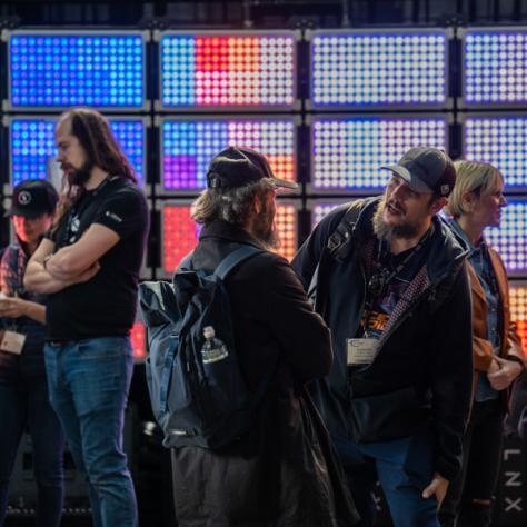 Photo of people taking and working. 