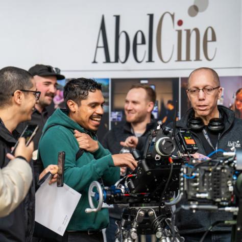 Group of people behind a camera. 