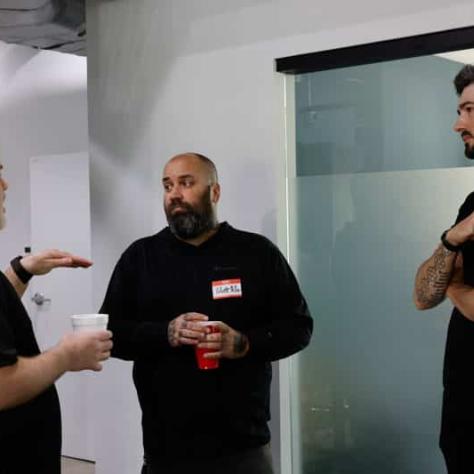 Men talking together. 