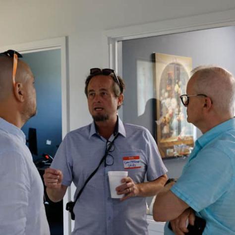 Men talking together. 