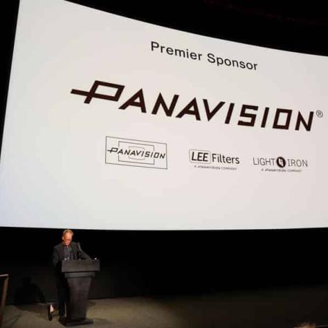 Panavision's David Dodson presents the Distinguished Filmmaker Award to Janusz Kaminski.