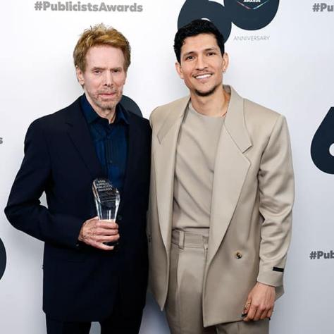 ICG PUBLICISTS AWARDS - Pictured: (l-r) Jerry Bruckheimer, Motion Picture Showperson of the Year, Danny Ramirez at the Beverly Hilton on March 10, 2023 - (Photo by: Trae Patton)