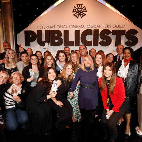 Group photo of people under 'Publicists' sign.