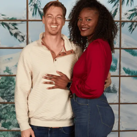 People posing for photo together. 