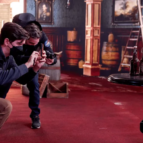 Two people taking a photo. 