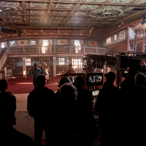 Back view of people looking at a set. 