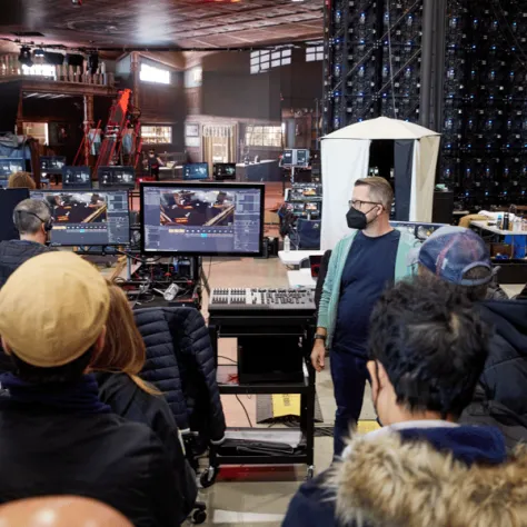 People looking at screens. 
