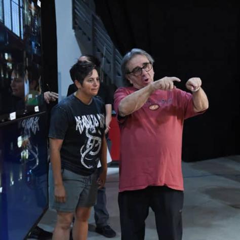 Man pointing and and talking to woman. 