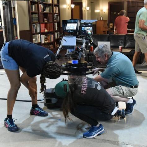 People working on a camera. 