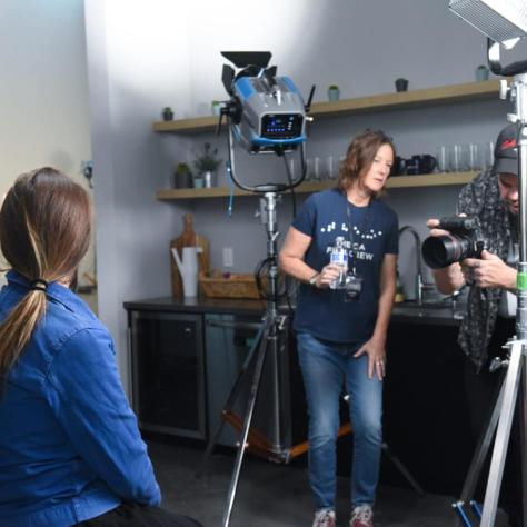 People working with a camera. 