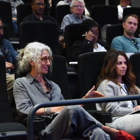People sitting in the audience. 