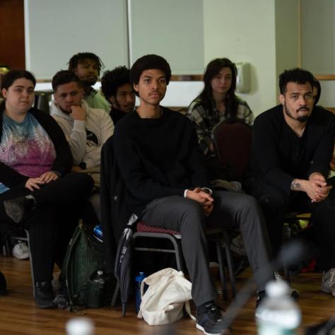 Audience members watching. 