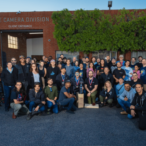 Group photo of people outside. 