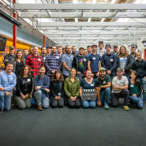 The group of people poses for a photo