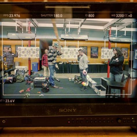 Image of a camera preview showing the group with colored tape on the floor