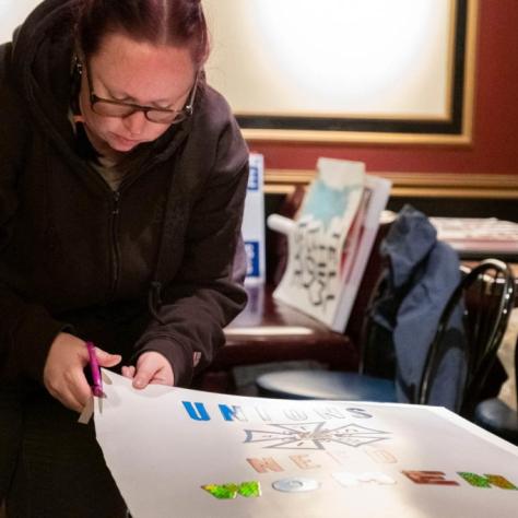 Woman making a sign