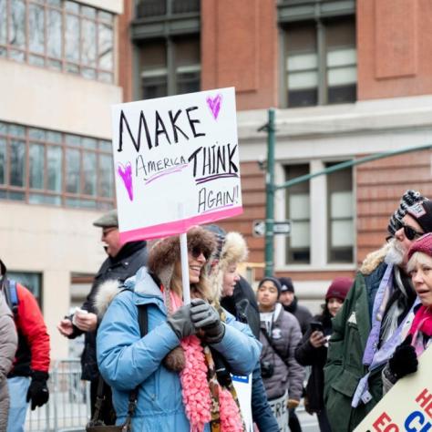 People holding signs