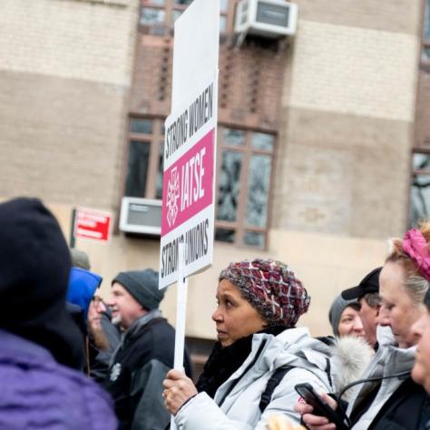 People holding signs and marching