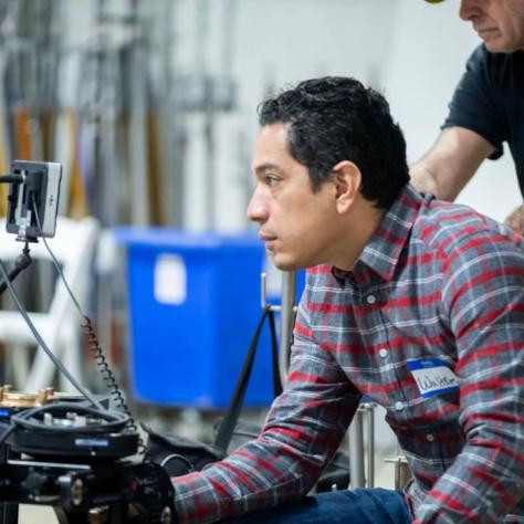 Man looks at a screen